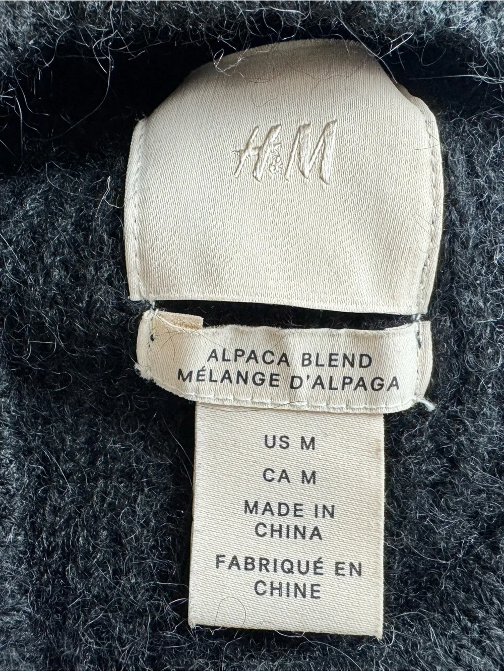 H&M Black Puff Sleeve Peplum Alpaca Sweater